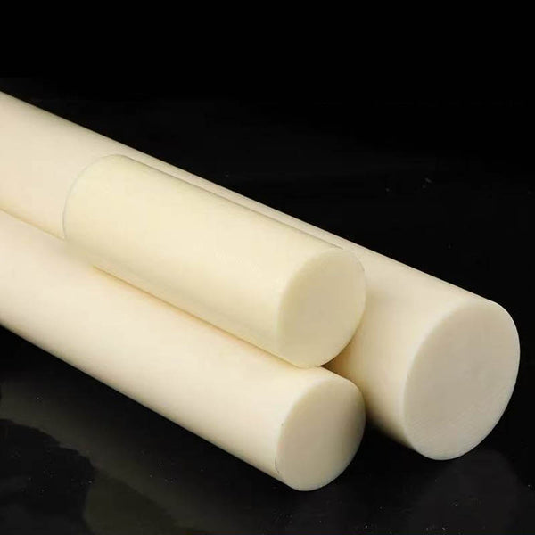 Close-up of black ABS rod surface texture for cutting and polishing