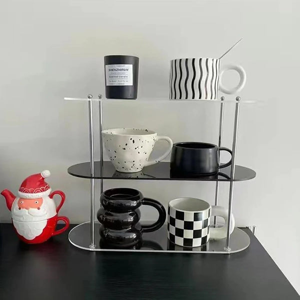 Top view of acrylic desk organizer displaying three-tier configuration and storage compartments
