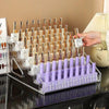 Transparent acrylic nail polish organizer – side angle view showing tier levels