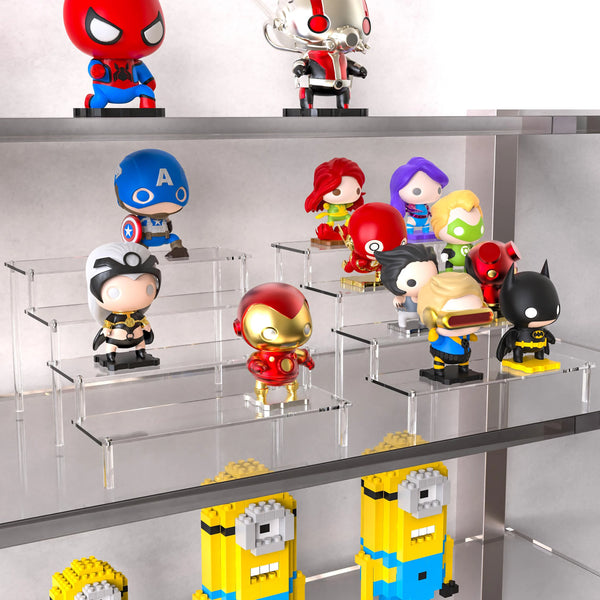 Clear acrylic tiered riser organizing perfume bottles on bathroom vanity