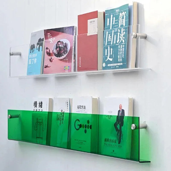 Wall-mounted acrylic shelf displaying books and makeup