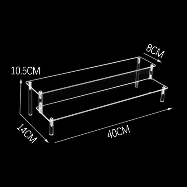 Bakery using tiered display for fresh cookies on retail counter showcase