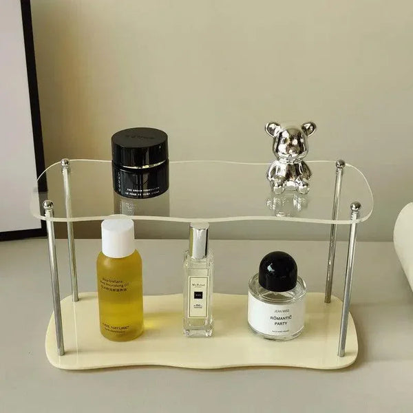 Acrylic perfume organizer placed on bathroom counter