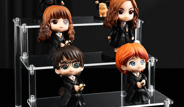 Multi-tier acrylic stand displaying anime figurines and models