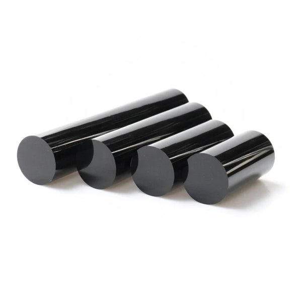 Side view of black acrylic display riser showing mirror polished surface and beveled edge