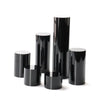 Wedding ring set displayed on black acrylic cylinder stands