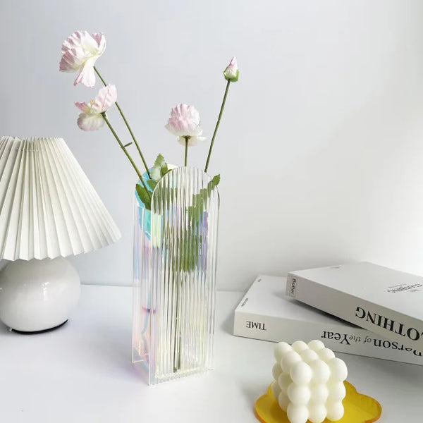 Geometric acrylic vases arranged as modern living room decor