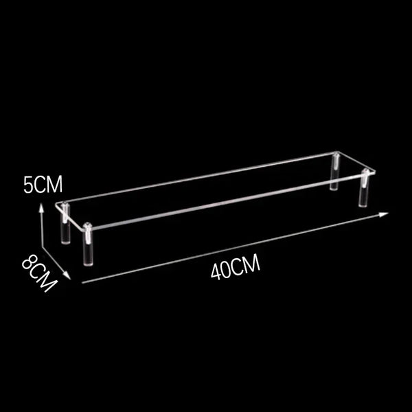 Shot glass collection organized on clear acrylic step display