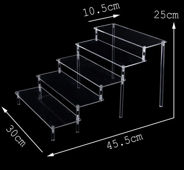 Skincare products arranged on multi-tier clear acrylic display