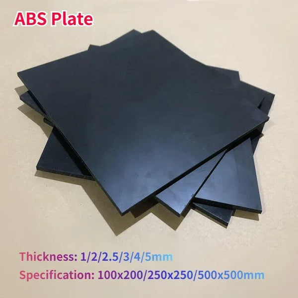 Smooth surface black ABS plastic board texture close-up