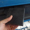 Black PTFE sheet in full view, cut to size for industrial applications