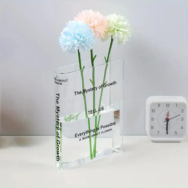 Clear acrylic book shaped vase front view with transparent design for office desk decor