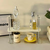 Clear acrylic vanity organizer with perfumes and skincare