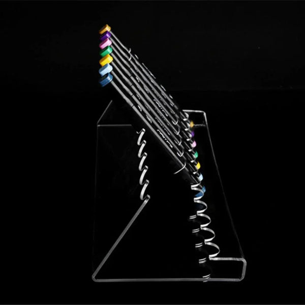 Transparent acrylic pen holder filled with colorful markers