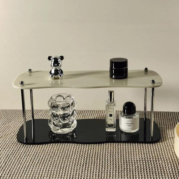 Acrylic storage rack with makeup and cosmetic bottles