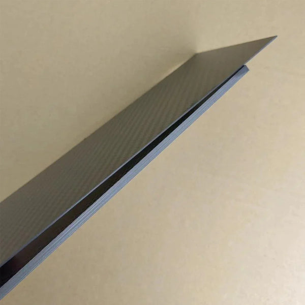 Custom CNC-cut carbon fiber sheet with matte and glossy surface