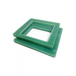 CNC machined green plastic frame - custom FR4 fabrication
