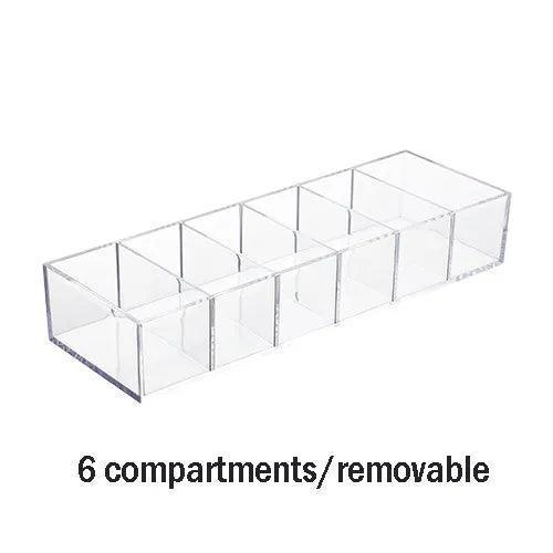 Clear acrylic organizer placed inside vanity drawer for storage