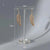 Acrylic earring holder with hoop earrings displayed