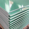 FR4 fiberglass epoxy sheet in water green, black, and yellow