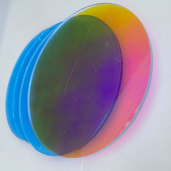 Trade show booth featuring iridescent acrylic signage attracting visitor attention