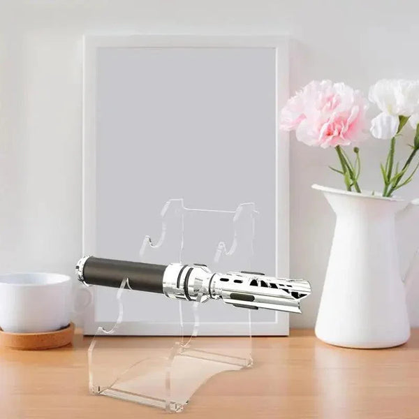 Force FX lightsaber displayed on acrylic stand