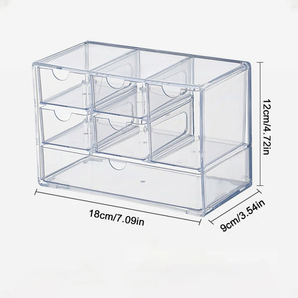 Office supplies organized in desktop acrylic drawer system