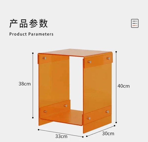 Orange double-deck acrylic coffee table showing storage