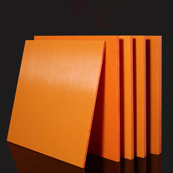 Orange bakelite sheet 3025 with measurement ruler for scale reference