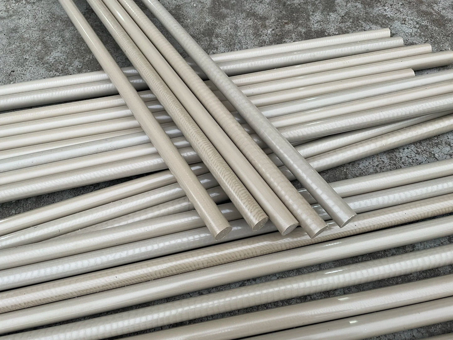 PEEK plastic rod on CNC lathe for industrial machining