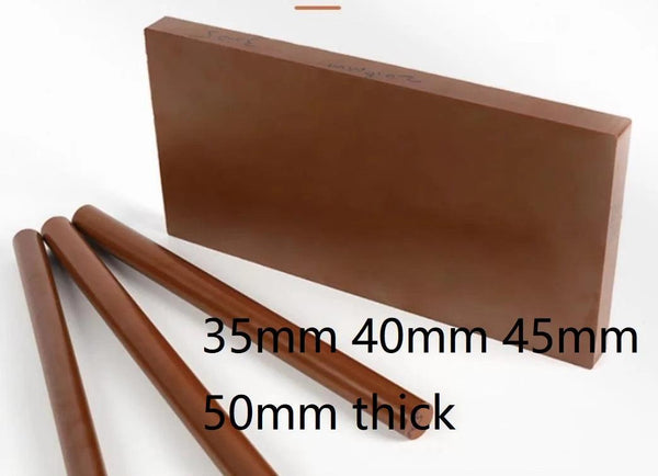 Polyimide SP-1 grade block 50×50 mm front view, high temperature resistant engineering plastic