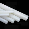 Close-up surface texture of high-performance PVDF plastic rod