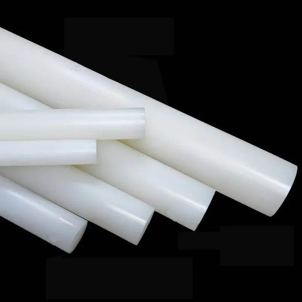 Close-up surface texture of high-performance PVDF plastic rod