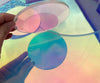 Size comparison of 100mm, 200mm, and 300mm iridescent acrylic circles side by side