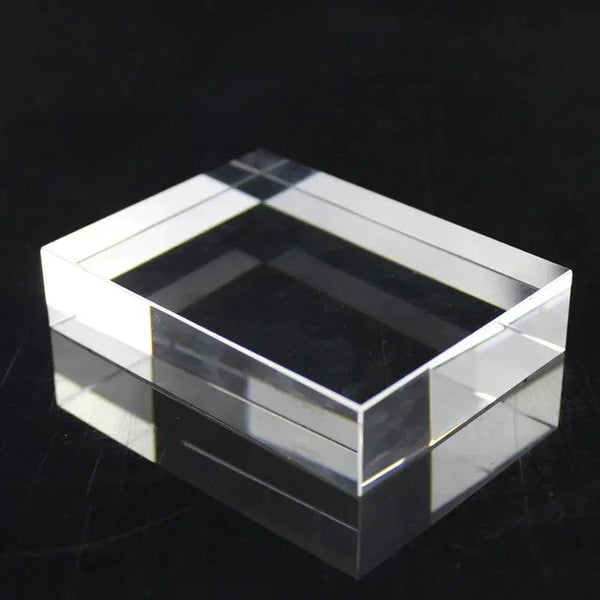 Ring placed on transparent acrylic block for photography