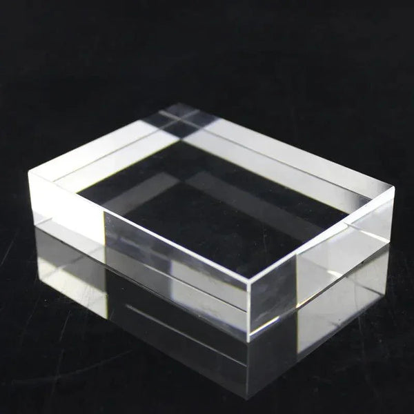 Ring placed on transparent acrylic block for photography