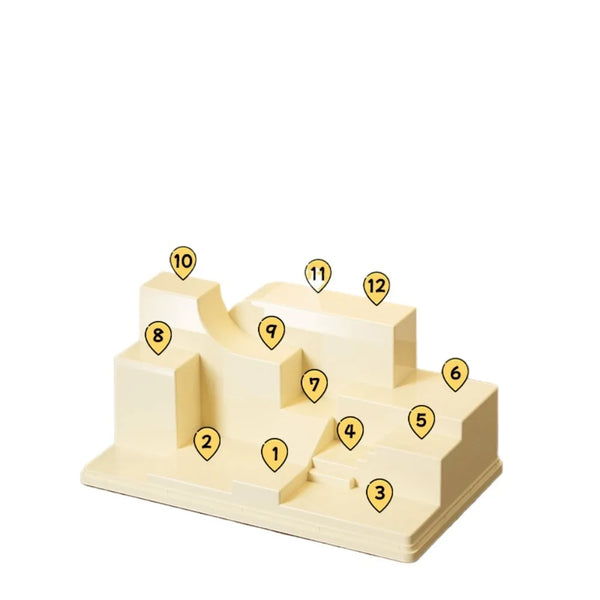Multiple stackable acrylic display cases vertically arranged showing modular expansion capability for growing collections
