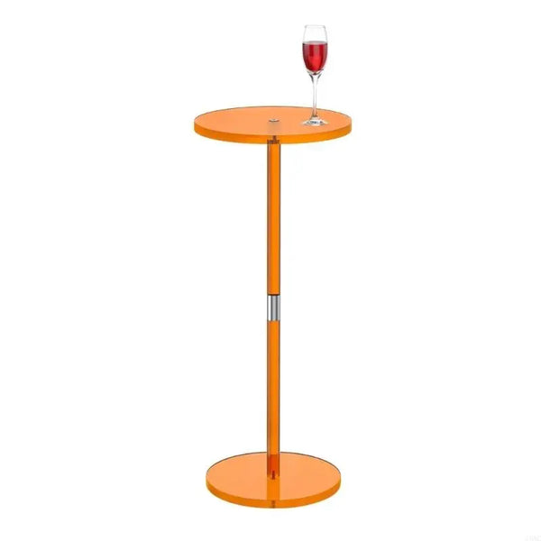 Durable acrylic coffee table supporting books and decorative items
