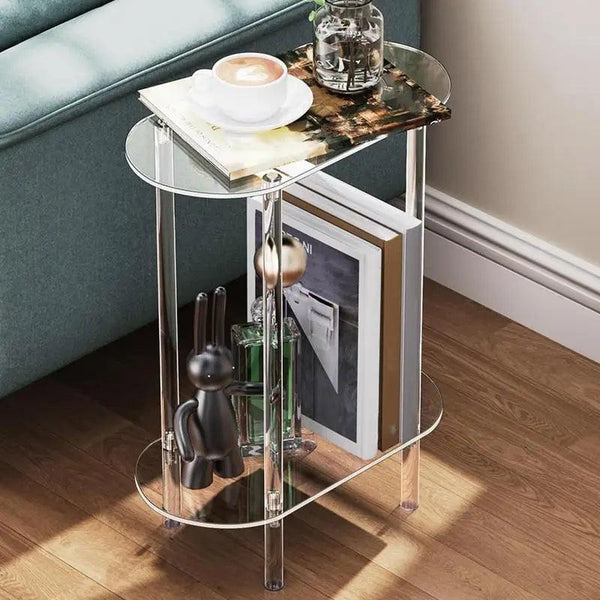 Modern transparent acrylic side table placed next to sofa in living room