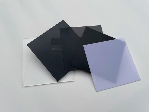 Comparison of clear and translucent black acrylic sheets for crafts and signage