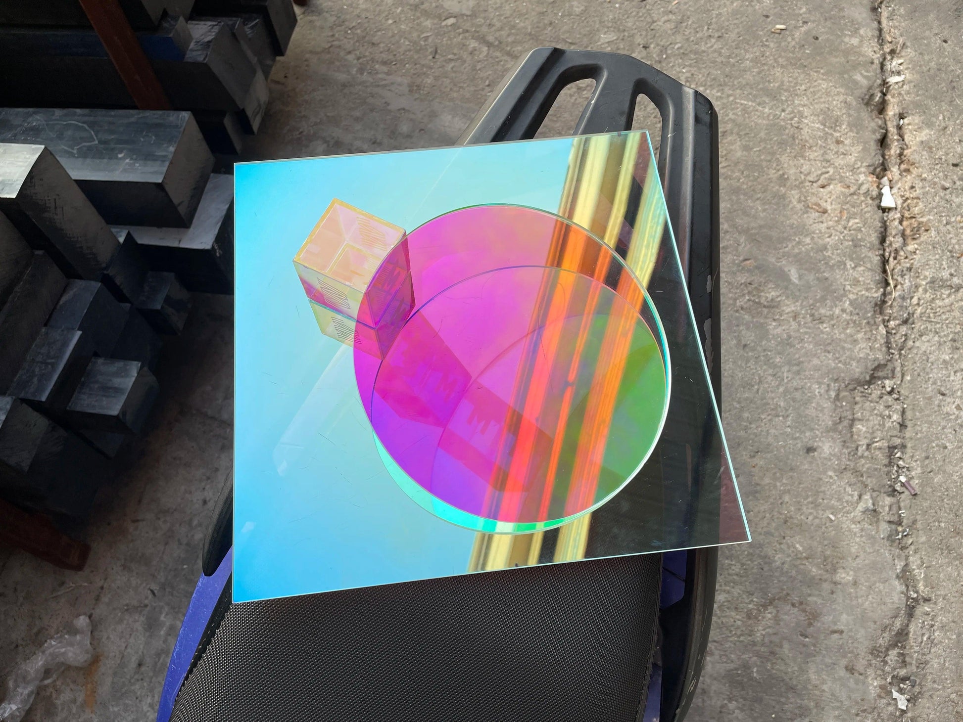 Precision laser cutting of iridescent acrylic sheet for intricate designs