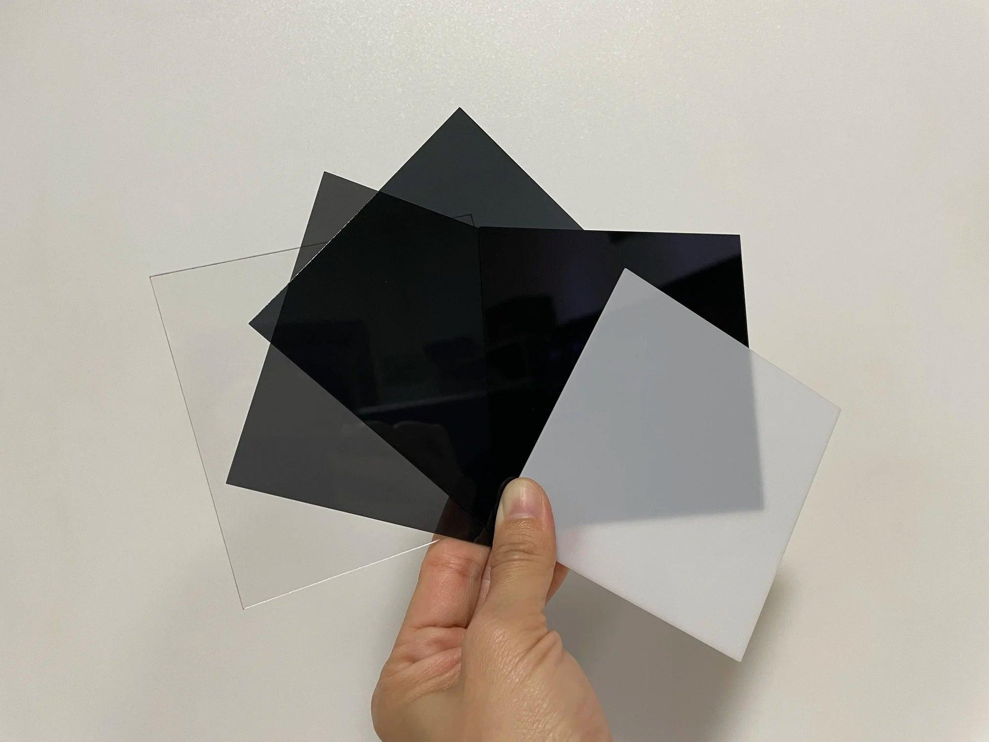 Translucent Black Acrylic Disc Close-up - Durable Plastic for Various Uses
