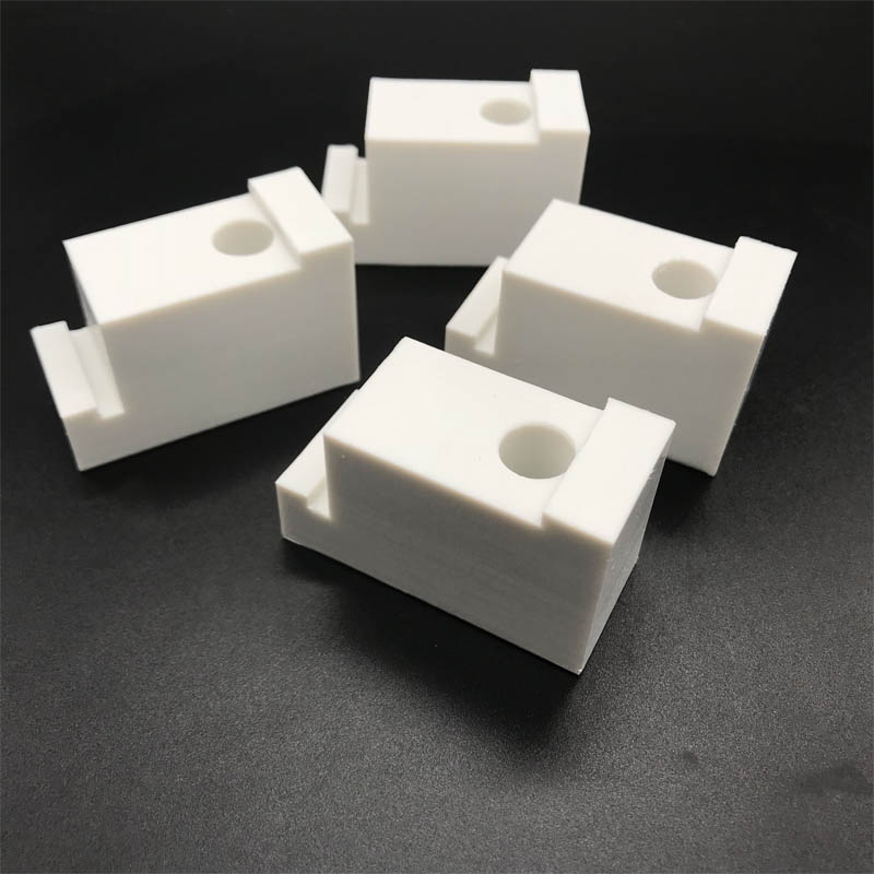 Multiple thickness options of black and white ABS plastic sheets stacked for selection