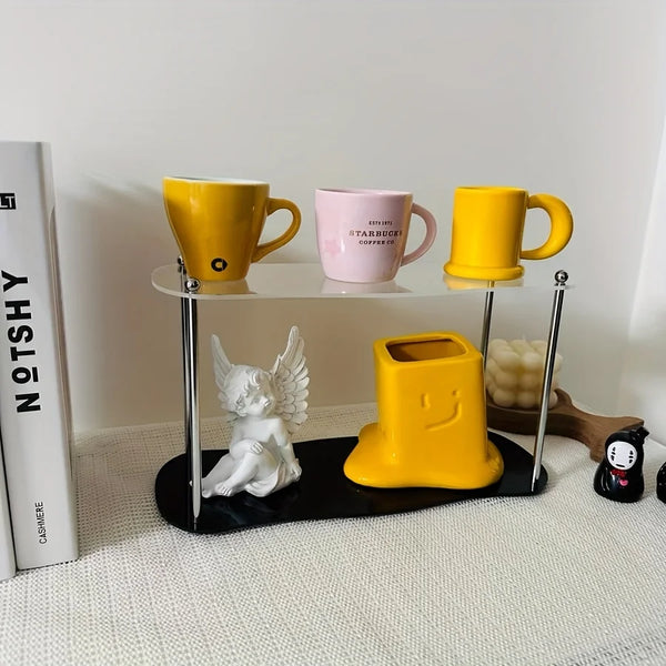 Clear acrylic makeup organizer stand displaying skincare bottles on a bathroom vanity.