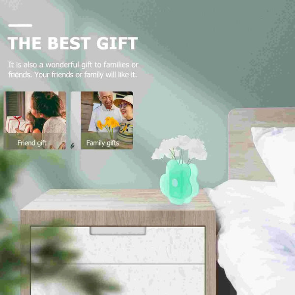 Wedding table decorated with acrylic flower vases