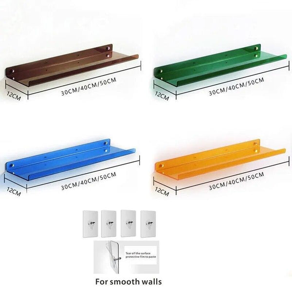 Wall-mounted clear acrylic shelf displaying decor in a modern bedroom