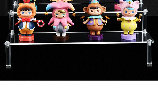 Acrylic tiered display stand showcasing action figures and collectibles