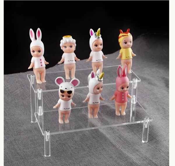 Beauty counter retail display using acrylic tiered stand organizer