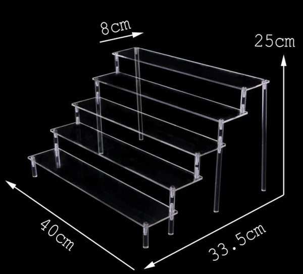 Cosmetics and makeup products on acrylic step display organizer