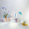 Geometric acrylic vase variant D on modern tabletop setting